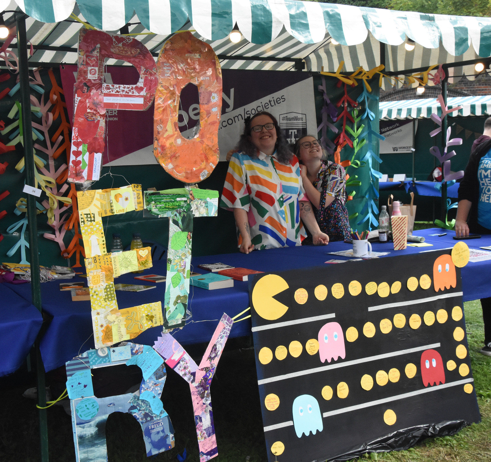 Photo of the Poetry Society manning their stall at Welcome Fair